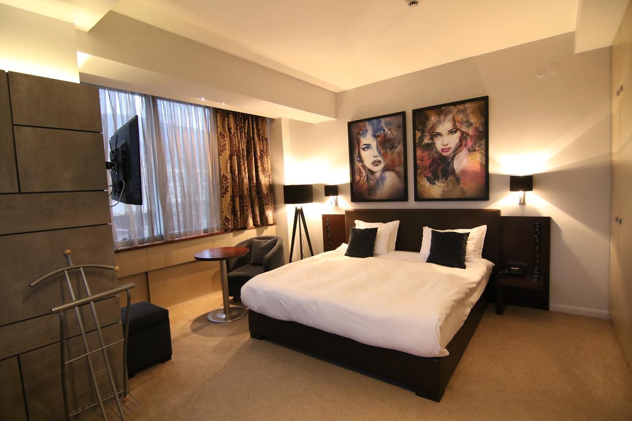 Queen'S Hotel - Zebra Centre 斯科普里 客房 照片
